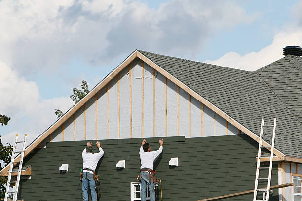Professional Siding Contractor technician working in Natrona Heights, PA